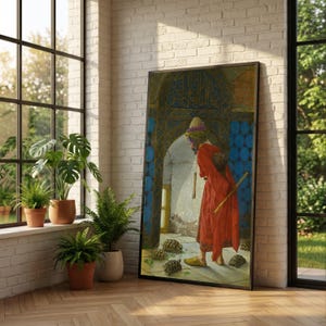 May include: A framed art print depicts a figure in a red robe and turban, holding a staff, surrounded by turtles. The background features an arched doorway and blue tilework. The artwork is displayed in a room with plants and a window.