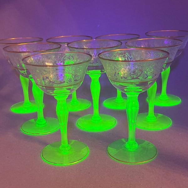 GLOWS Uranium Green Glass Champagne Glasses with Gold Gilding and Etched Filligri Pattern. Qty 9 Glasses Total.