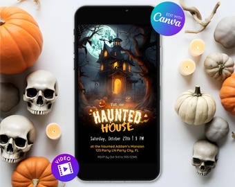 May include: A smartphone displays a Halloween-themed invitation with a haunted house graphic. The phone is surrounded by pumpkins, skulls, and candles. The invitation text reads "HAUNTED HOUSE" and includes event details.