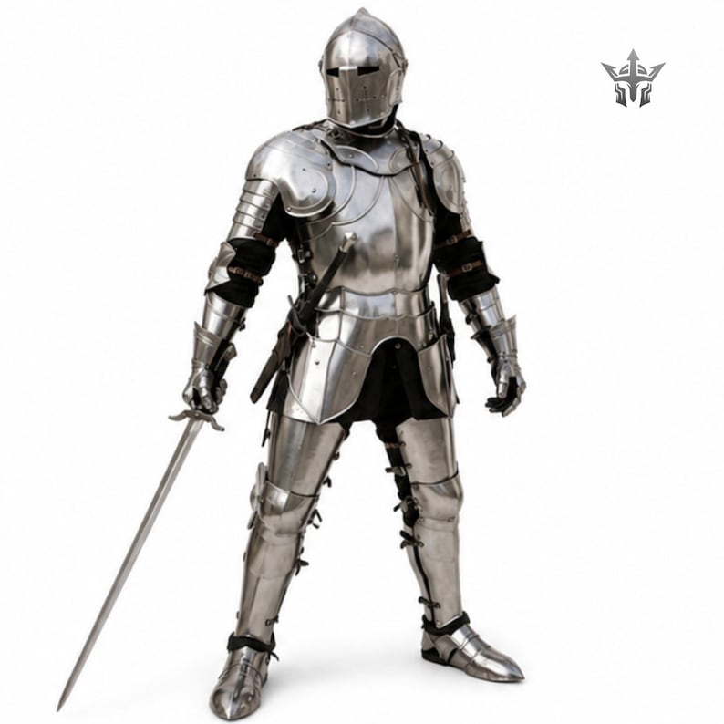 May include: A full suit of polished steel plate armor featuring a closed helmet, articulated pauldrons, gauntlets, and greaves. The armor includes a breastplate, tassets, and a longsword held in the right hand, with black fabric visible underneath.