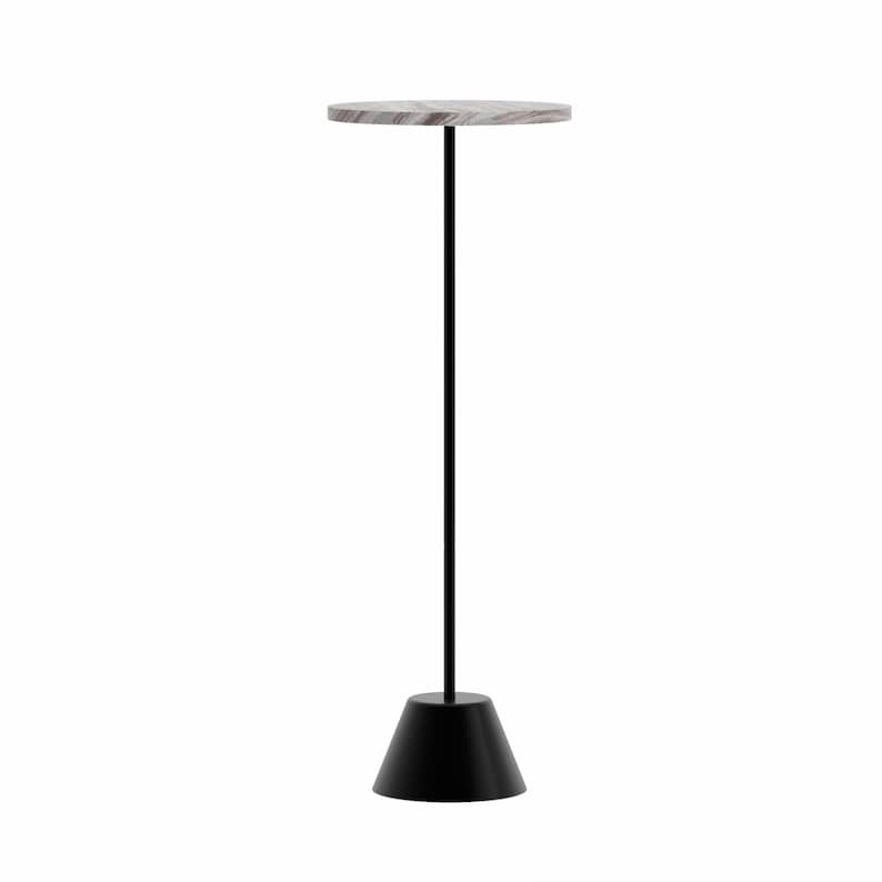 "Modern minimalist drink table with white banswara marble top and black metal pedestal base."