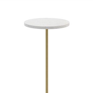 May include: A round marble table with a gold metal base. The table is white with gray veining and the base is a cylinder shape.