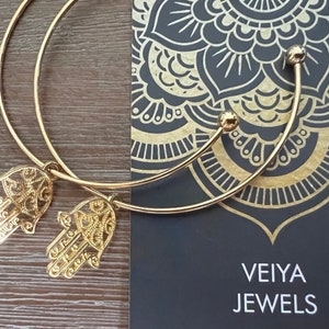 large hoop earrings, gold colored, with Fatima&#39;s hand