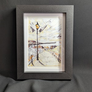 whitby steps print in a black frame in crayon