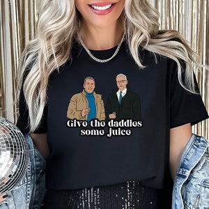 Andy + Anderson CNN New Year&#39;s Eve Give the Daddies Some Juice Bravo T-Shirt | Bravo TV Gift As Seen on The Late Show with Stephen Colbert!