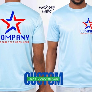 May include: Light blue short-sleeved t-shirts with a star logo in red and blue. The shirts have the word "COMPANY" and "CUSTOM TEXT GOES HERE" printed on them. The text "QUICK-DRY FABRIC" is also visible.