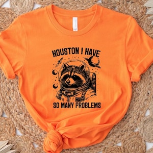 Houston I Have So Many Problems Shirt, Funny Graphic Shirt, Raccoon In Space Shirt, Funny Raccoon Shirt,Raccoon Outfits, Galaxy T-shirt
