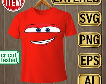 May include: A red t-shirt featuring a cartoon car face design with blue eyes and a smiling mouth. The shirt is hanging on a wooden hanger. The image includes the text "DIGITAL ITEM" and "CRICUT TESTED".