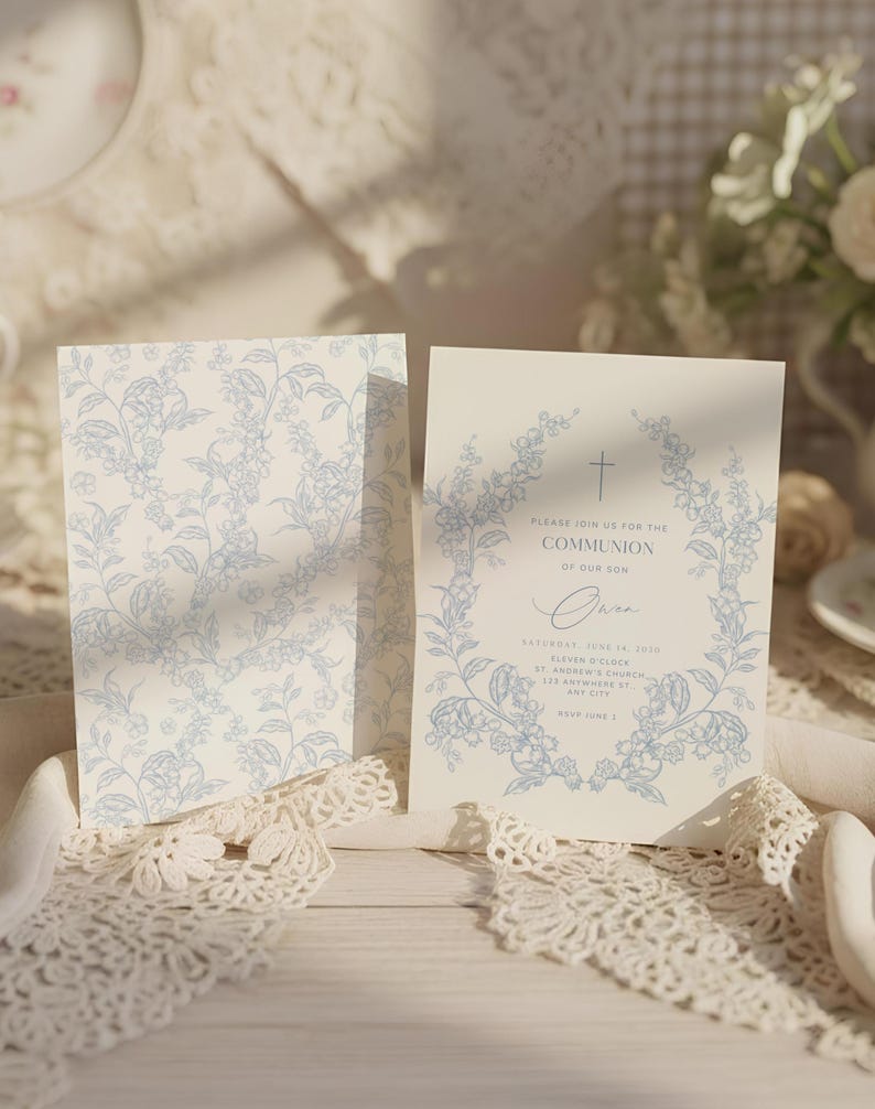 May include: Two invitation cards with a floral design in light blue. One card features a full floral pattern, while the other has a floral wreath around the text "PLEASE JOIN US FOR THE COMMUNION OF OUR SON".