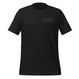 May include: A black t-shirt with a simple line drawing of a car on the front.