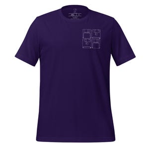 May include: A purple t-shirt with a white outline of four floppy disks stacked on top of each other.
