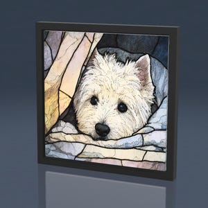 May include: A framed artwork featuring a West Highland White Terrier dog. The dog's white fur contrasts with the colorful, stained-glass style background. The artwork is encased in a black frame, creating a striking visual.