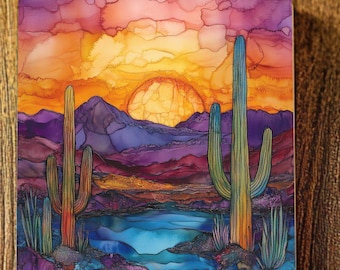 May include: A painting of a desert landscape with a sunset in the background. The painting features two tall cacti in the foreground, a blue lake, and purple mountains in the distance.