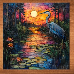 May include: A blue heron stands in a swampy area with a sunset in the background. The water is filled with lily pads and the sky is a mix of orange, pink, and purple.