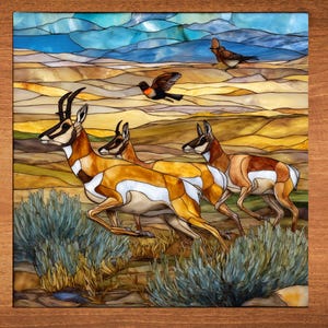 May include: Stained glass panel featuring a herd of pronghorn antelope running across a desert landscape. The artwork includes birds in flight and a blue sky background. The panel is framed in a wooden border.