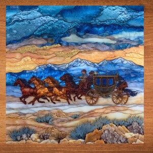 May include: A decorative panel featuring a stagecoach pulled by horses, set against a backdrop of mountains and a blue sky. The artwork uses a variety of colors, including brown, gold, and blue, to create a detailed landscape scene.