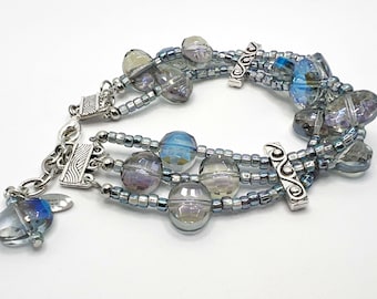 Iridescent Glass Beaded Tri-strand Bracelet