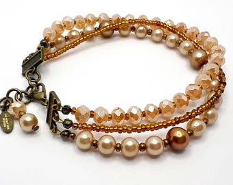 Champagne Toned Crystals and Pearl Beaded Tri-strand Bracelet