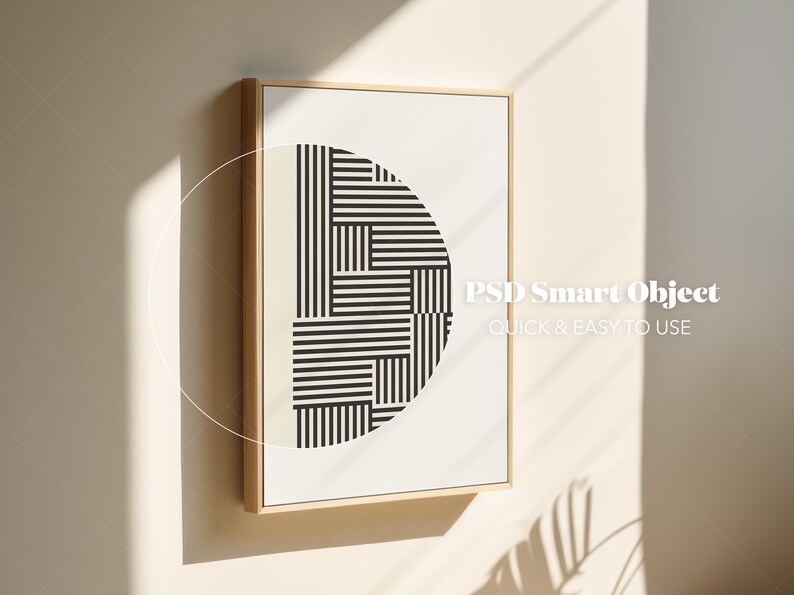 May include: A framed print featuring a black and white geometric design in the shape of a semi-circle. The print is in a light wood frame and is hanging on a white wall. The text "PSD Smart Object QUICK & EASY TO USE" is visible in the bottom right corner of the print.