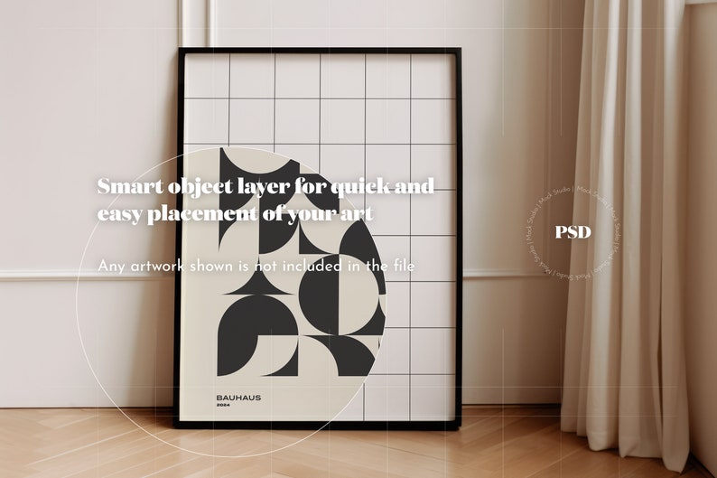 May include: A black framed poster with a white background and a geometric design in black and white. The poster has the text "Smart object layer for quick and easy placement of your art" and "Any artwork shown is not included in the file". The poster also has the text "BAUHAUS" at the bottom.