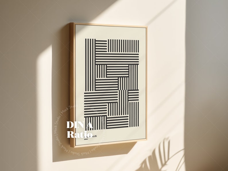 May include: A framed black and white geometric print with a wooden frame. The print features a pattern of horizontal and vertical lines.