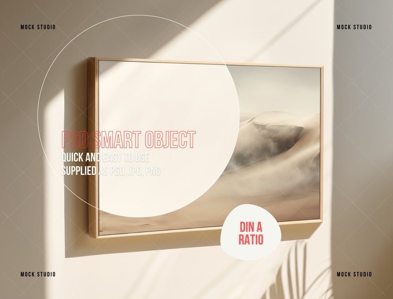 May include: A framed print of a desert landscape with sand dunes. The frame is a light wood colour and the print is in a muted colour palette. The print is labelled "DIN A RATIO".