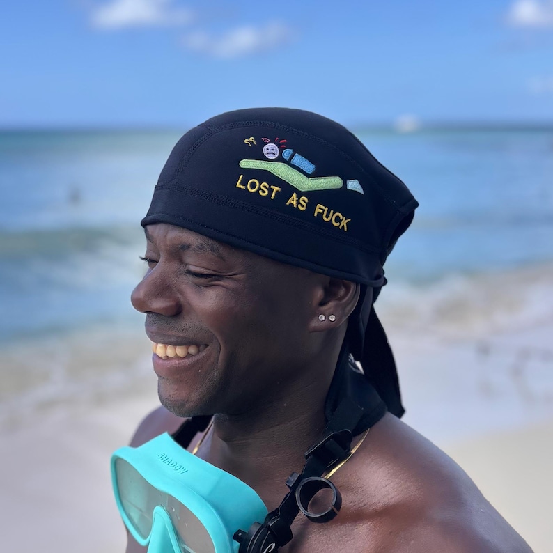 Black beanie featuring a scuba diver