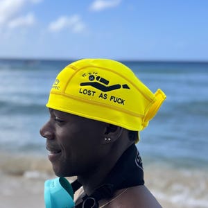 Yellow beanie featuring a scuba diver