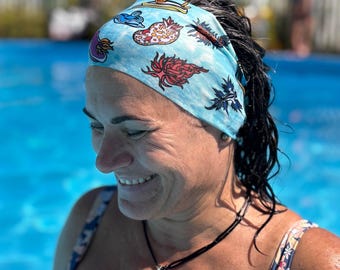 Womens headbands with sun protection featuring nudibranch. Chlorine & saltwater resistant, quick-dry, stylish for water sports and yoga
