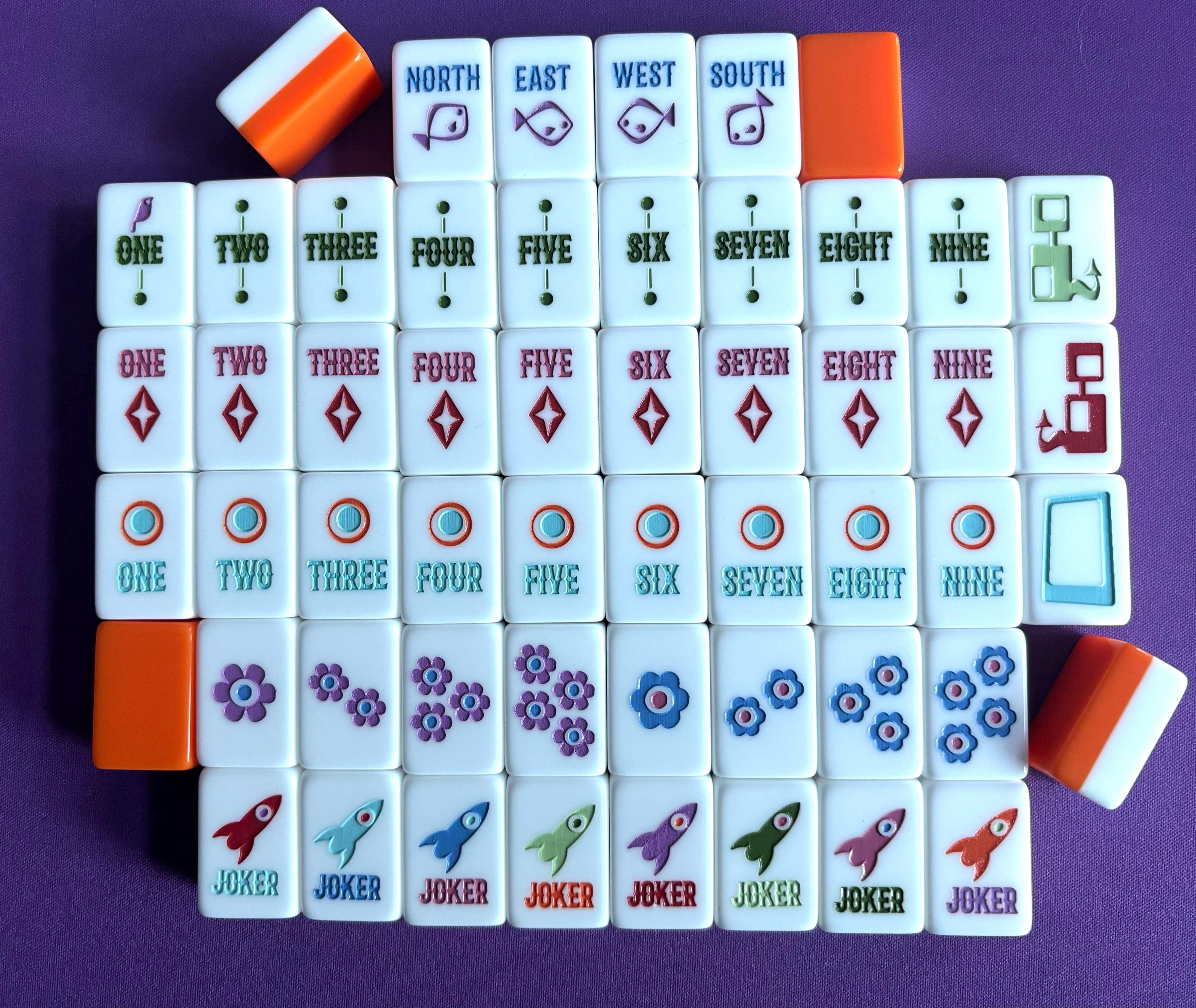 Faye's Petite Atomic Age Sputnik Mahjong tiles set Tang Orange back from Two Sparrows Mahjong for games on the go