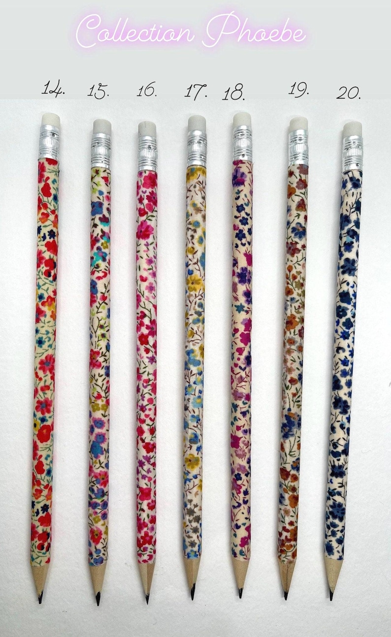 May include: A set of seven pencils with floral patterned designs. The pencils are all the same size and have a white background with colorful flowers. The pencils are numbered 14 through 20.