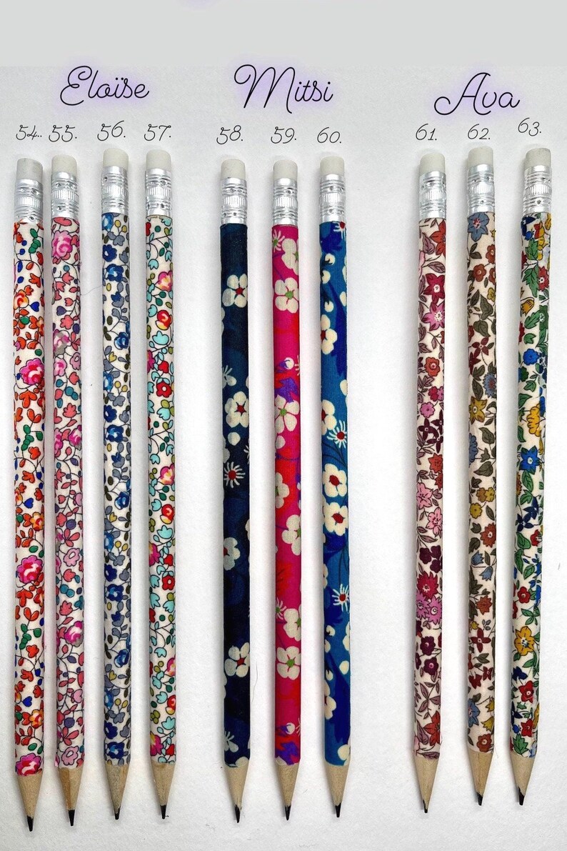May include: Nine pencils with different floral patterned designs. The pencils are labeled with numbers 54-63. The pencils have silver colored tops with erasers.