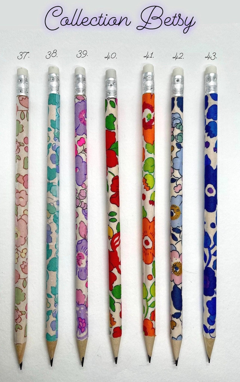May include: Collection of six pencils with different floral patterns. The pencils are numbered 37 through 42.