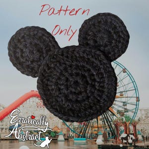 May include: A black crocheted item shaped like a mouse head with two circular ears and a larger circular face. The text "Pattern Only" is written in red above the item, and the logo "Erratically Abstract" is at the bottom left.