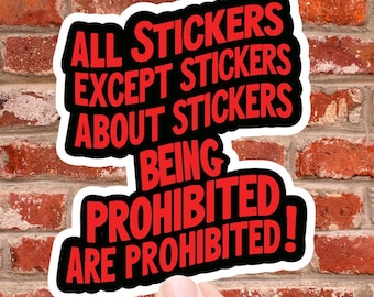 May include: A black and red sticker with the text "All stickers except stickers about stickers being prohibited are prohibited!"