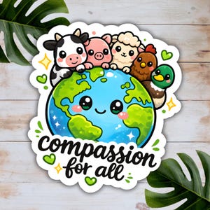 May include: A die-cut sticker featuring a cartoon globe with a smiling face, surrounded by a cow, pig, sheep, chicken, and duck. The text "compassion for all" is written in black script below the globe, accented by small green hearts and yellow stars.