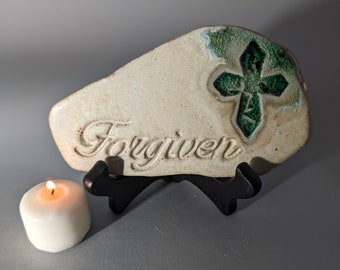 Hand carved Inspirational word, stoneware plaque, handcrafted, fused green glass cross, ivory matt glaze. Christian decor, FORGIVEN