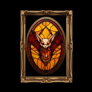 May include: A stained glass artwork featuring a bat design in a gold ornate frame. The bat has red eyes and wings, set against a yellow and red background. The frame has a detailed, vintage aesthetic.