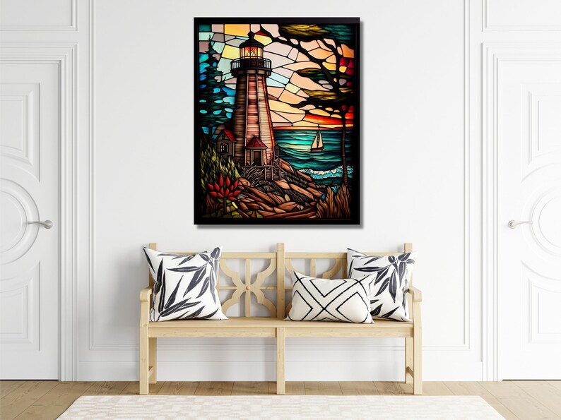 May include: A stained glass window depicting a lighthouse on a rocky shore with a sailboat in the distance. The sky is a vibrant orange and yellow, with blue and green water. The lighthouse is white with a red roof and a black lantern.