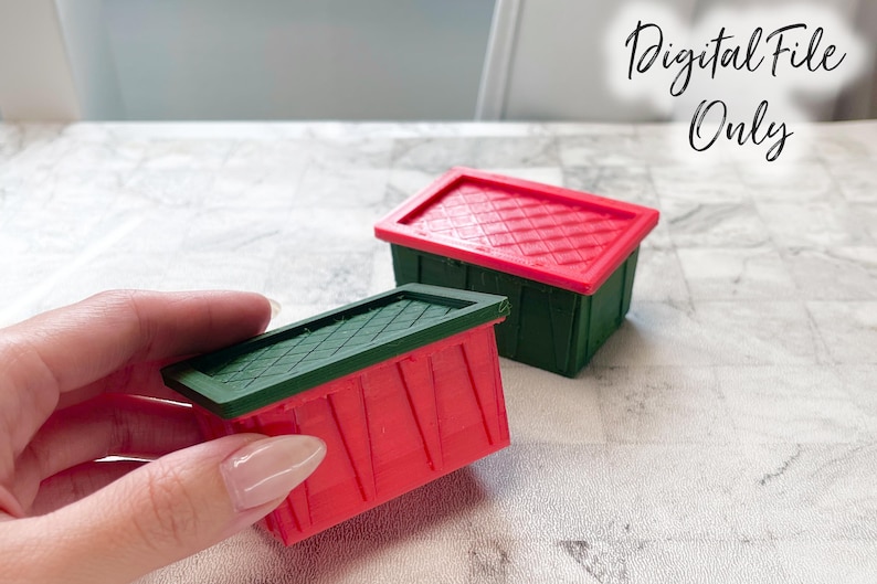 May include: Two miniature storage bins with lids. One bin is red with a green lid, and the other bin is green with a red lid.  The bins are made of plastic and have a checkered pattern on the lids.  Digital File Only.