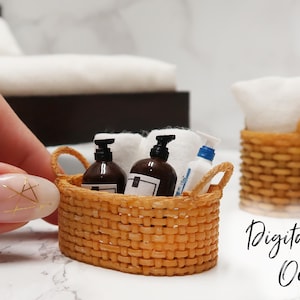 May include: Two miniature wicker baskets filled with miniature toiletries, including two brown bottles and a white tube. The baskets are on a white surface.