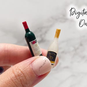 May include: Miniature wine bottles, one green with a red cap and label, the other white with a gold cap and black label. The text "Digital File Only" is written in cursive.