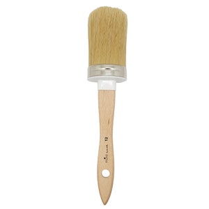 May include: A 12-inch round paint brush with a wooden handle and a white ferrule. The brush is labeled "mini-me" and "12".
