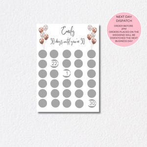 May include: A white countdown calendar with the name "Emily" and the phrase "30 days until you're 30" in elegant script. It features 30 grey circles, with the numbers 22, 1, and 30 visible. Balloons decorate the top.