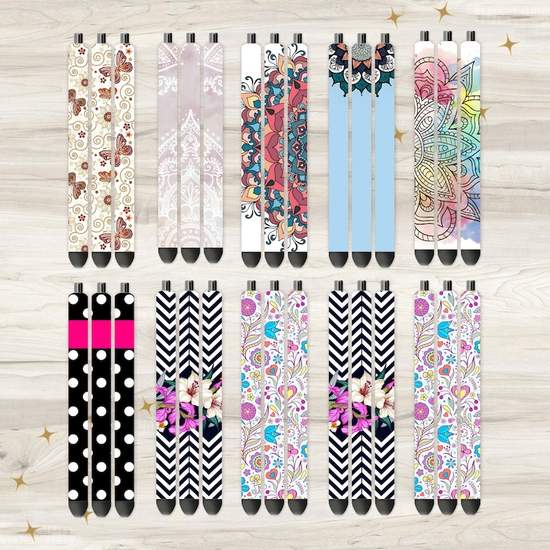 May include: Set of 12 colorful patterned pen sleeves. The sleeves feature a variety of designs, including floral, geometric, and abstract patterns. The sleeves are made of a durable material and are easy to apply and remove.