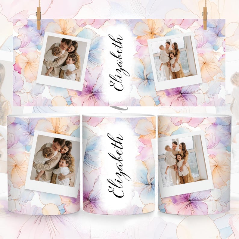 May include: Two white mugs with a watercolor floral design and a photo of a family. The mugs have the name "Elizabeth" written on them.