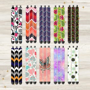May include: Set of 12 colorful patterned pen sleeves. The sleeves are made of a durable material and feature a variety of designs, including geometric patterns, floral prints, and abstract designs.