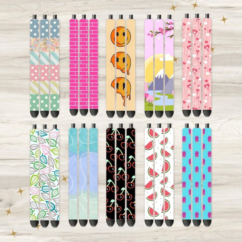 May include: Set of 12 colorful patterned phone grips. The grips are made of silicone and have a variety of designs, including floral, geometric, and abstract patterns. The grips are designed to be attached to the back of a phone to provide a better grip and prevent drops.