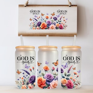 May include: Three frosted glass tumblers with bamboo lids and clear straws. Each tumbler features a floral design with butterflies and the text "God is good" in black lettering.