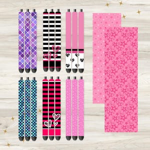 May include: Set of 10 colorful patterned pens with different designs, including hearts, stars, and geometric patterns. The pens are arranged in three rows on a wooden surface.